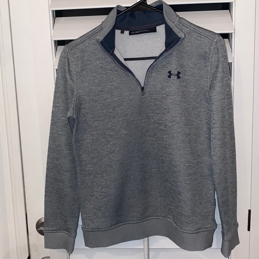 Under armour zip up. Kids large. Looks brand new